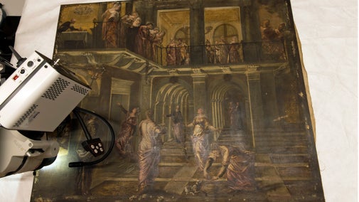 A large painting, by Tintoretto shows a group of women inside a classical building, some are looking over a balcony. A microscope is positioned over part of the painting.